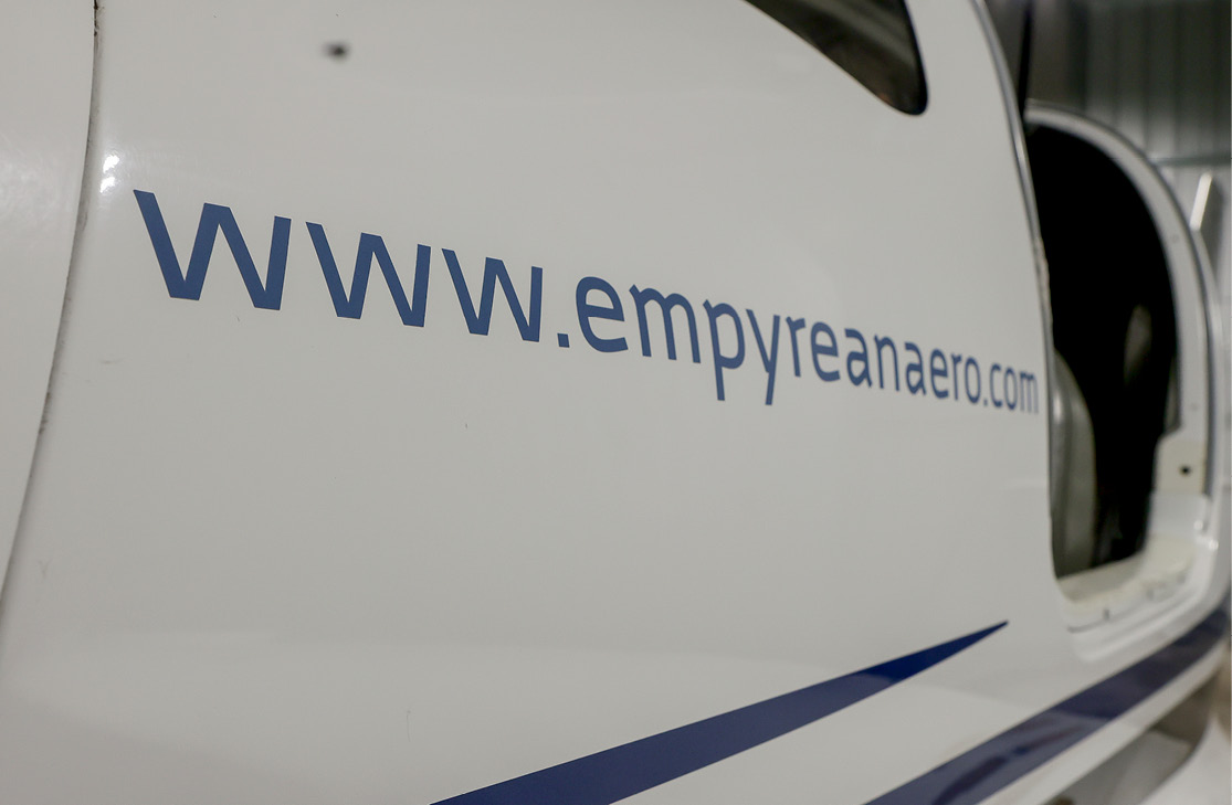 Empyrean Aero plane with website address on fuselage