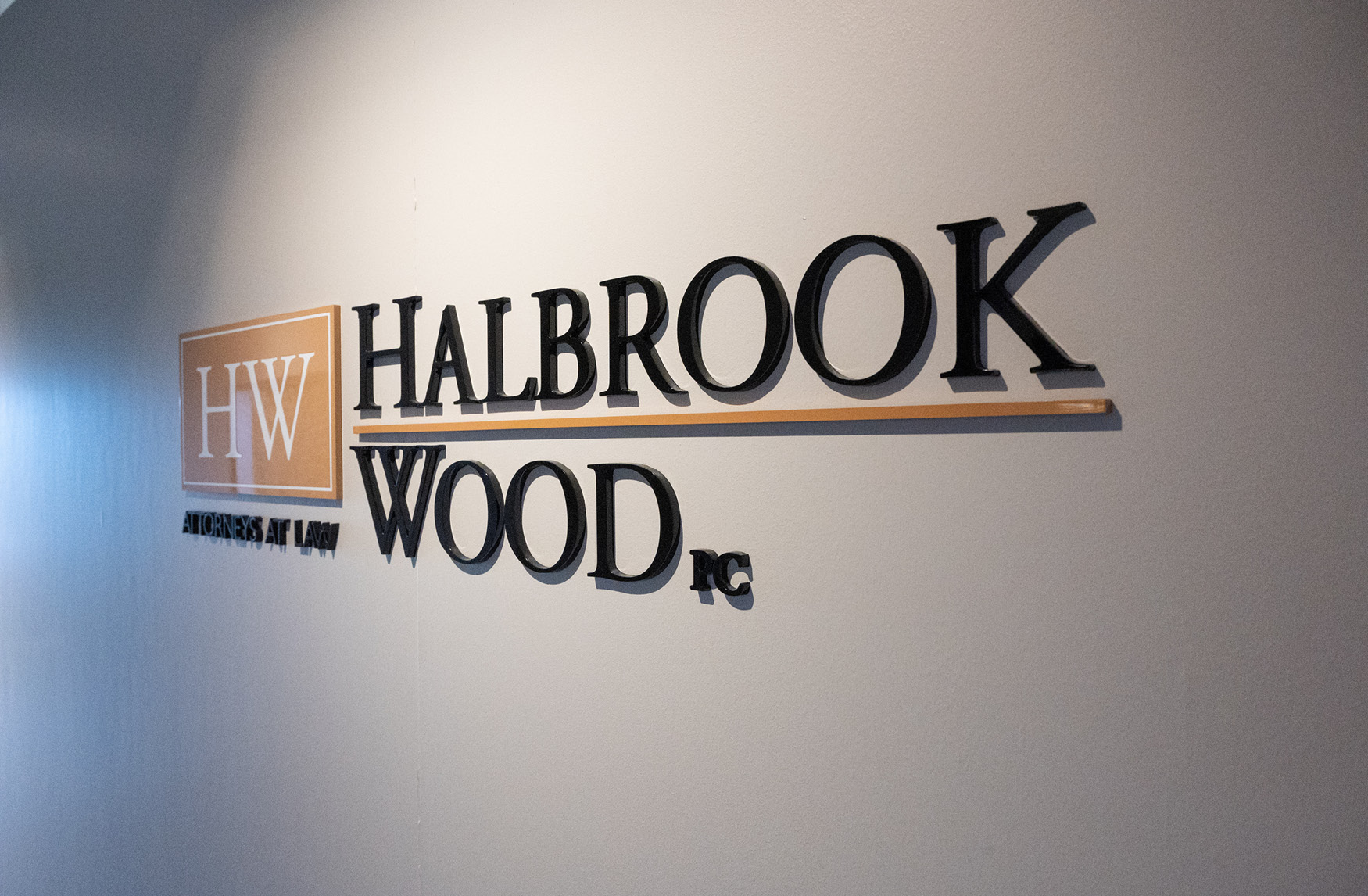 Halbrook Wood logo on office wall